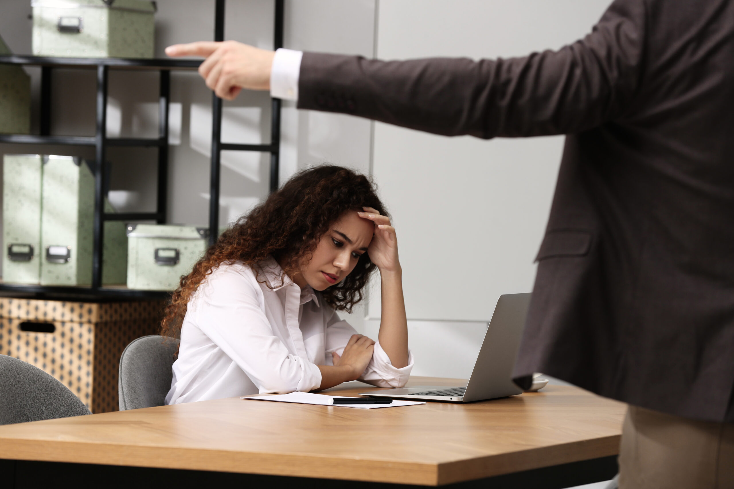 African American woman suffering from racial discrimination at work